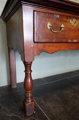 Lot 129 - Dresser base. A good George III period oak dresser base