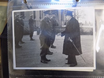 Lot 262 - WWII photographs. An album of WWII photographs including Churchill