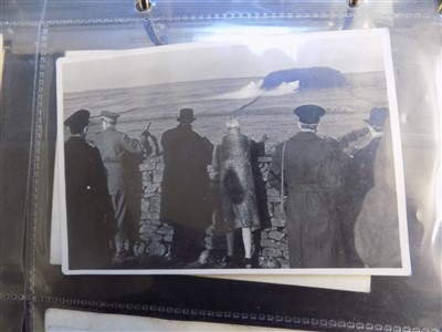 Lot 262 - WWII photographs. An album of WWII photographs including Churchill