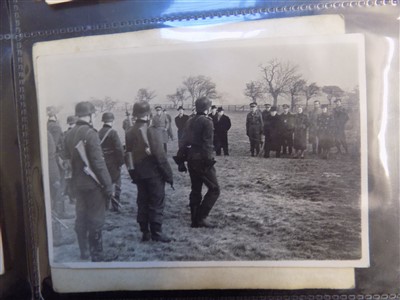 Lot 262 - WWII photographs. An album of WWII photographs including Churchill