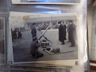 Lot 262 - WWII photographs. An album of WWII photographs including Churchill