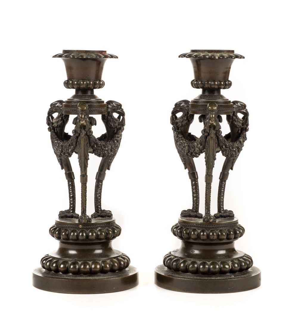 Lot 43 - Candlesticks. A pair of 19th century French bronze candlesticks