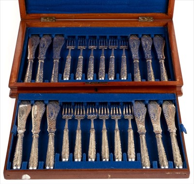 Lot 84 - Fish eaters. A set of Victorian cased silver-plated fish knives and forks