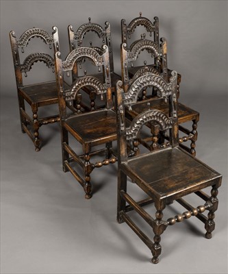 Lot 123 - Chairs. A set of six 19th century carved oak dining chairs
