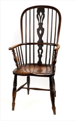 Lot 120 - Chair. A 19th-century elm Windsor chair