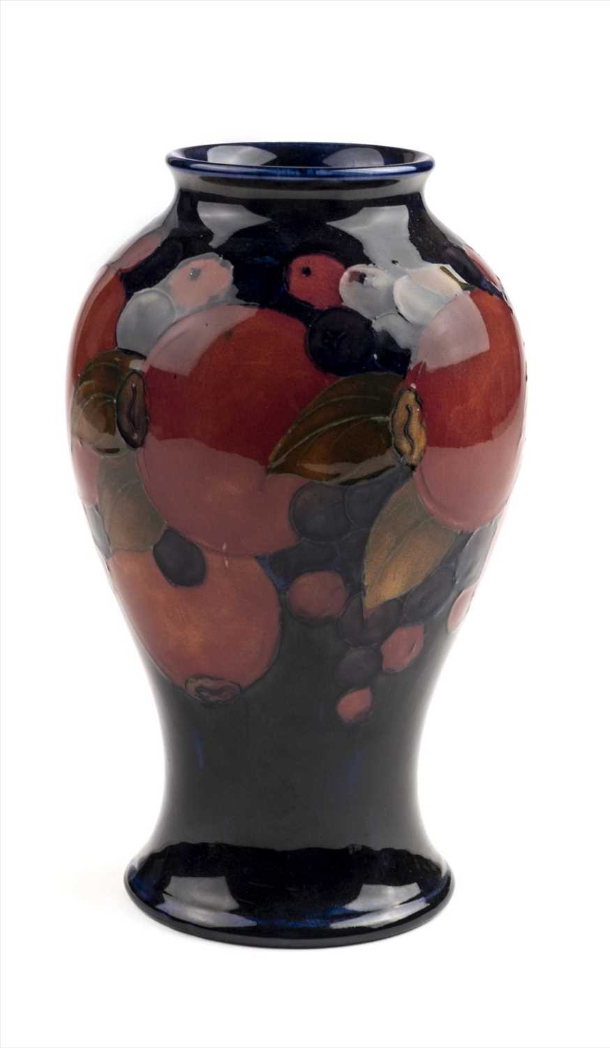 Lot 12 - Moorcroft. A Moorcroft pottery 'Pomegranate' pattern vase