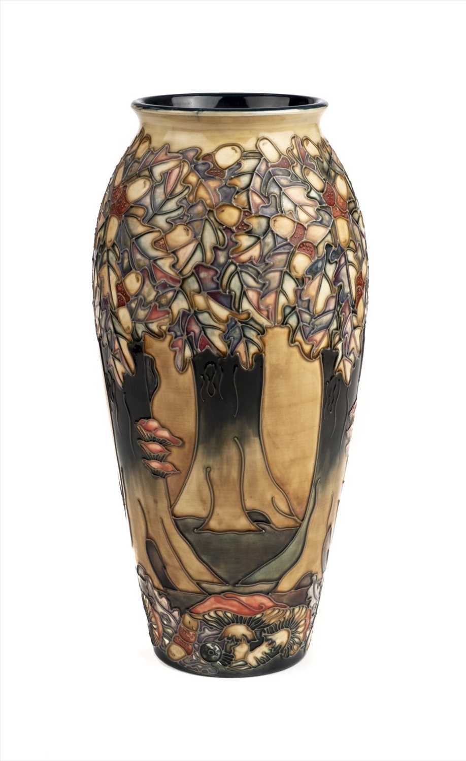 Lot 19 - Moorcroft. A Moorcroft pottery 'Knightwood' pattern vase