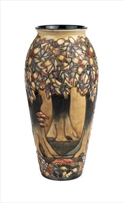 Lot 19 - Moorcroft. A Moorcroft pottery 'Knightwood' pattern vase