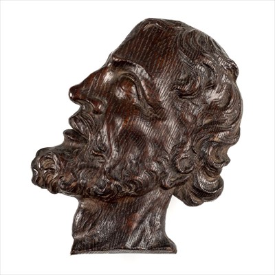 Lot 60 - Oak carving. A 17th century carved oak profile of a man
