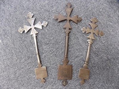 Lot 107 - Abyssinian Coptic cross. A 20th century brass processional cross and related items