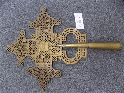 Lot 107 - Abyssinian Coptic cross. A 20th century brass processional cross and related items