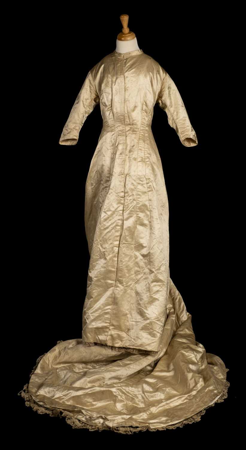 Lot 170 Dress. A satin wedding dress, circa 1890