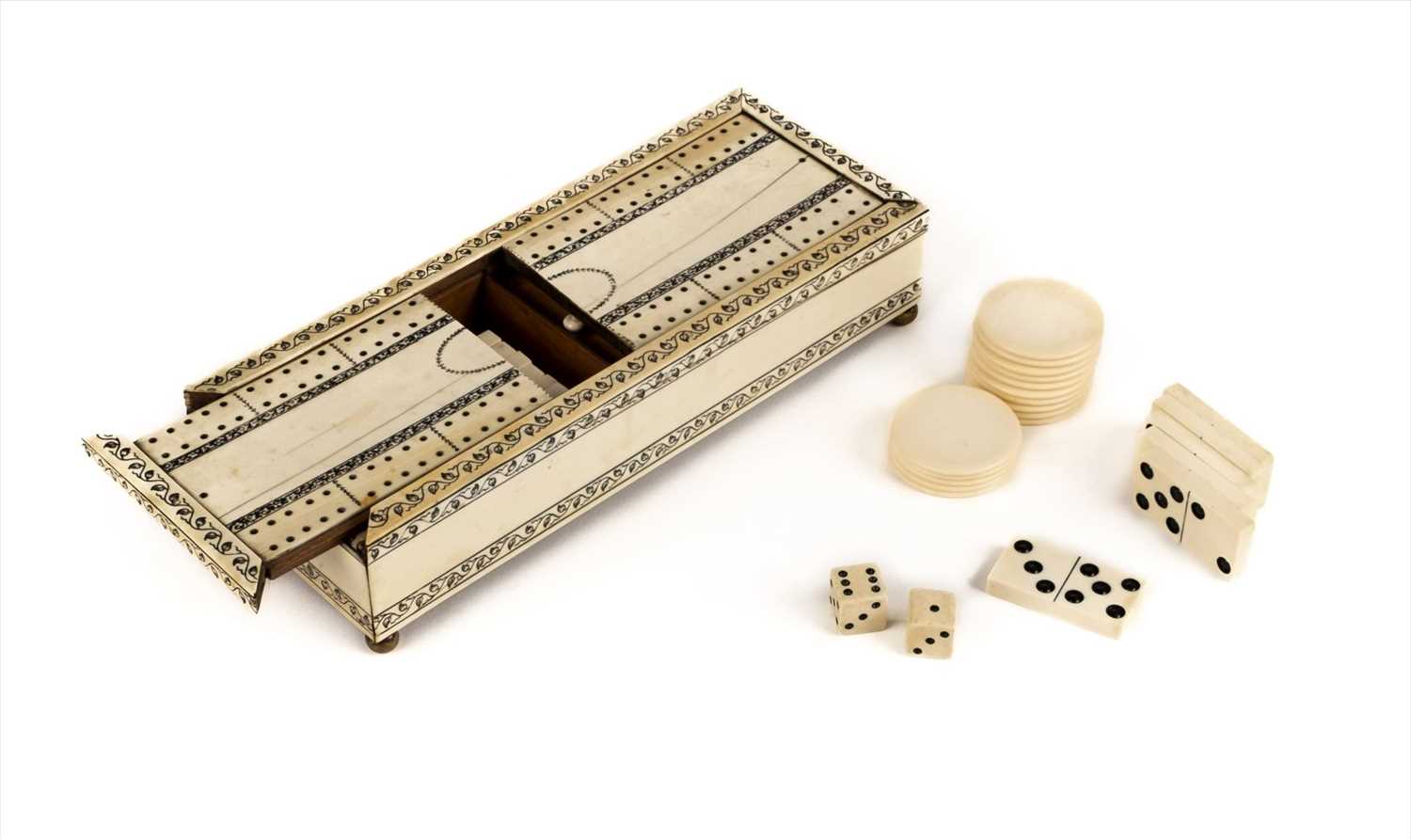 Lot 95 - Anglo Indian. A Vizagapatam ivory games box c.1820