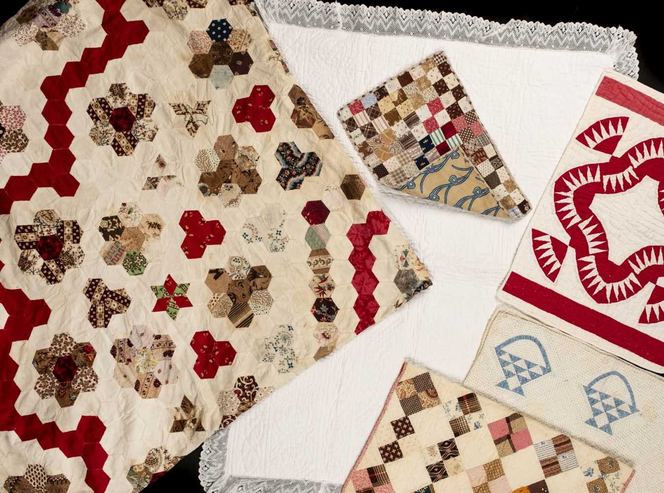 Lot 181 - Quilts. A Victorian patchwork quilt, and others