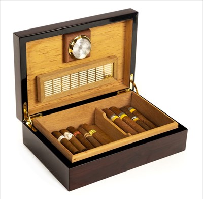Lot 44 - Cigars. A fine collection of 143 Cuban cigars housed in 3 humidors