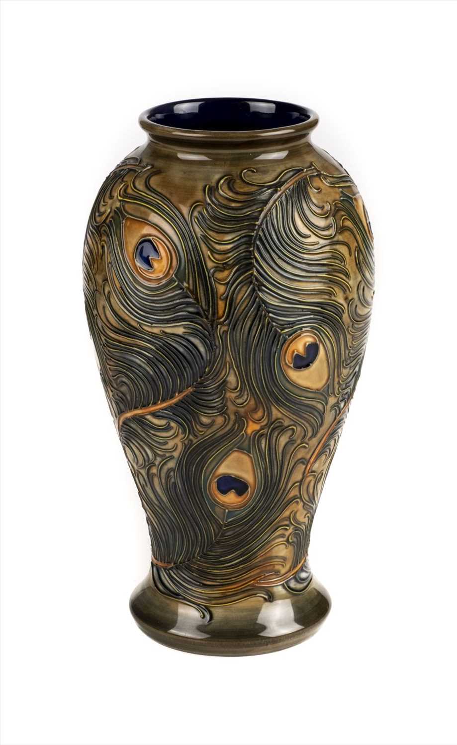 Lot 11 - Moorcroft. A Moorcroft pottery 'Peacock' pattern vase