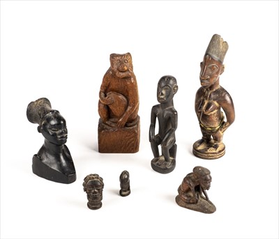 Lot 115 - Tribal figures. A mixed collection of carved wood figures