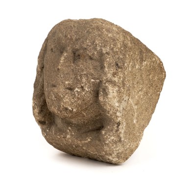 Lot 55 - Medieval corbel. A stone corbel carved as a head