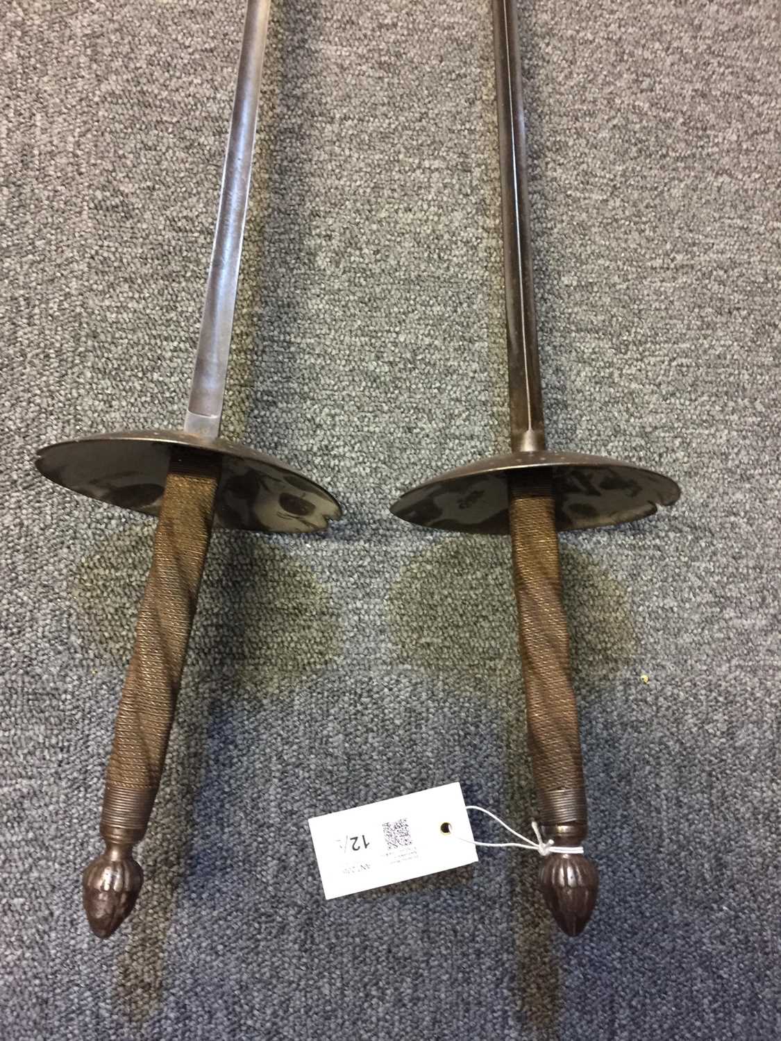 Lot 12 Swords. A pair of 19th century fencing swords