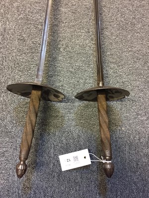 Lot 12 - Swords. A pair of 19th century fencing swords by Henry Wilkinson