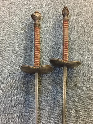 Lot 11 - Swords. A collection of fencing foils