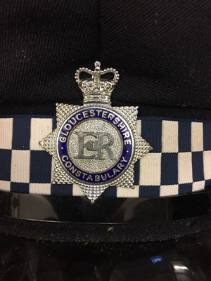 Lot 219 - Gloucestershire Police helmet and hat