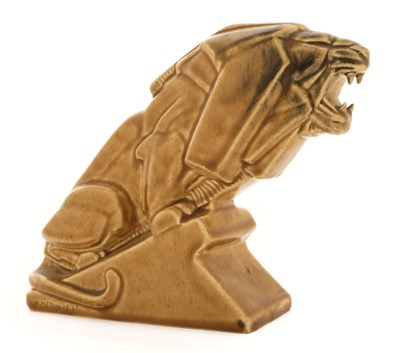 Lot 301 - Metcalfe (Percy, 1895-1970). An Ashstead Pottery 'Lion on Industry' c.1925