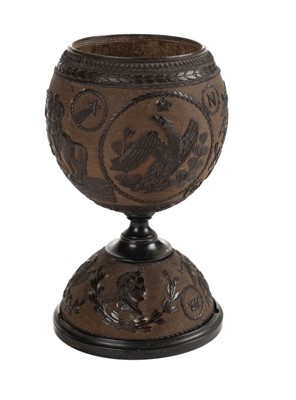 Lot 99 - Coconut cup. A mid-19th century carved Napoleonic coconut cup