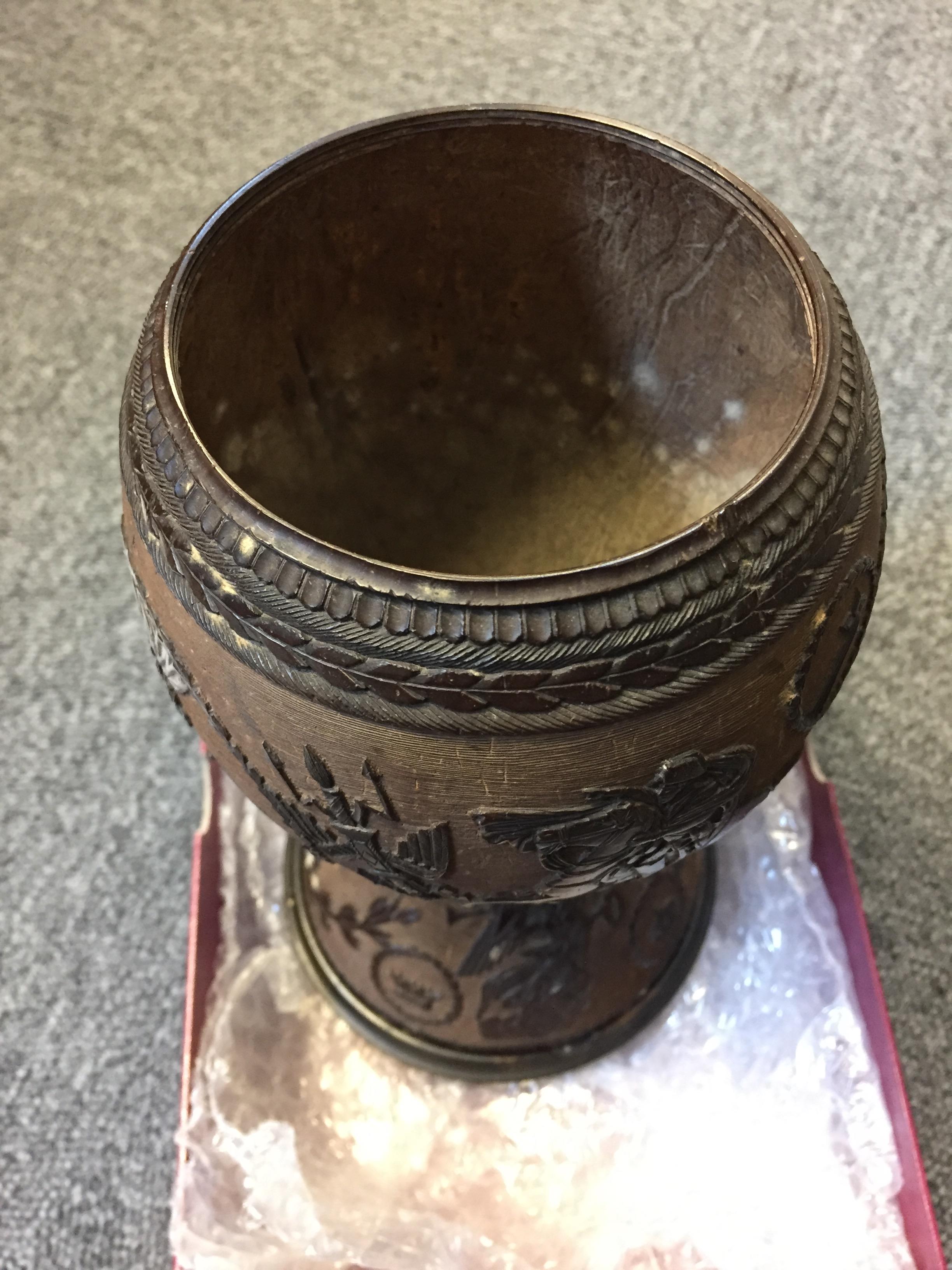 Lot 99 - Coconut cup. A mid-19th century carved