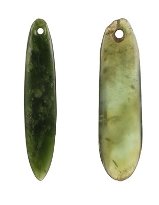 Lot 248 - New Zealand. 19th century Maori greenstone / nephrite jade ear pendants (koru pounamu)