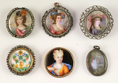 Lot 434 - Miniatures. Three enamel portraits of young beauties, mid 19th century