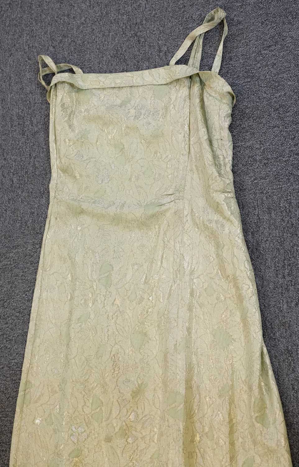 Lot 266 - Dress. A 1920s evening gown and train, and a