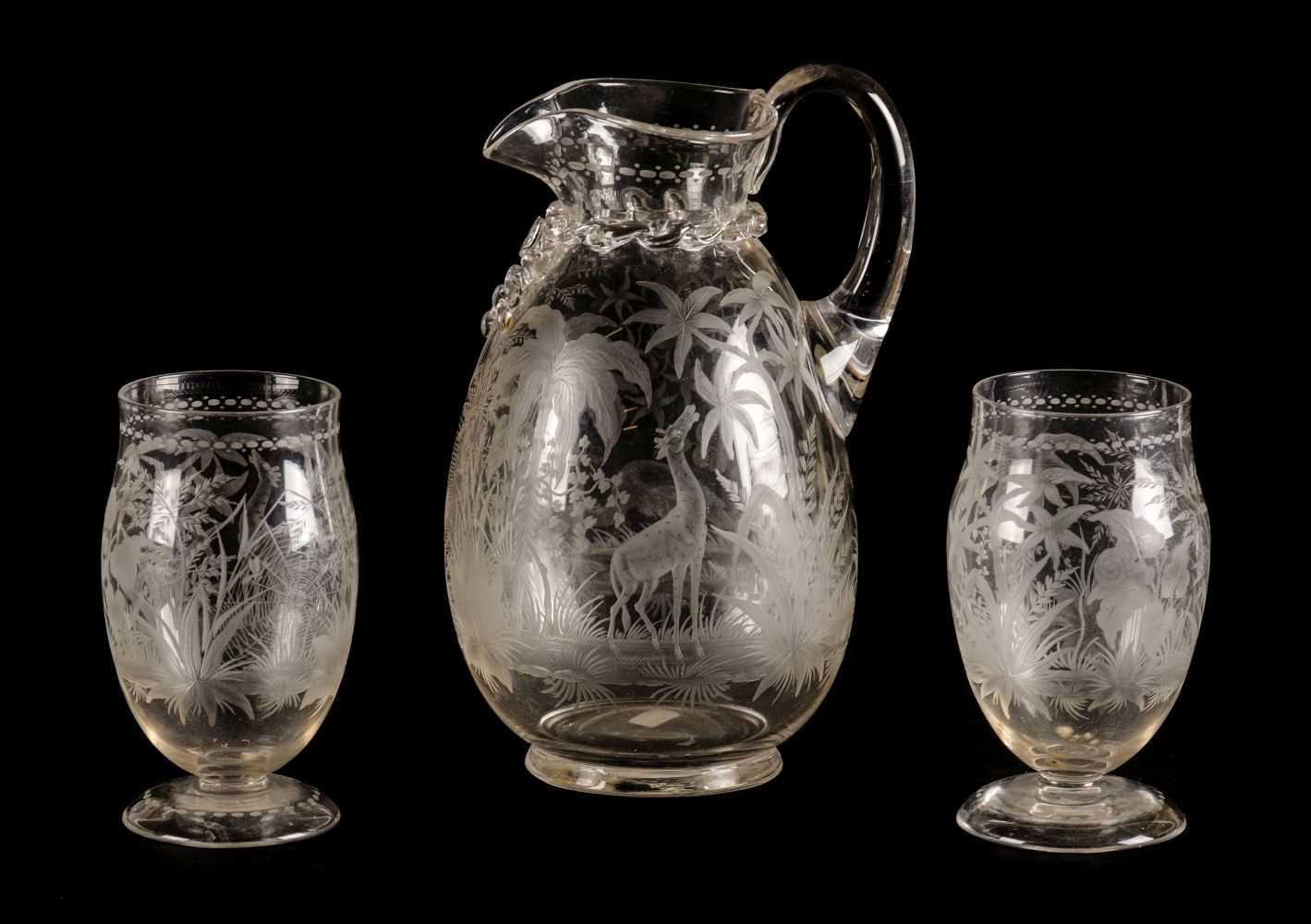 Lot 298 - Glassware. A fine Victorian glass jug and two tumblers