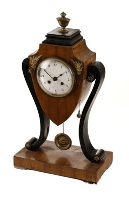 Lot 94 - Clock. A Regency style mantel clock