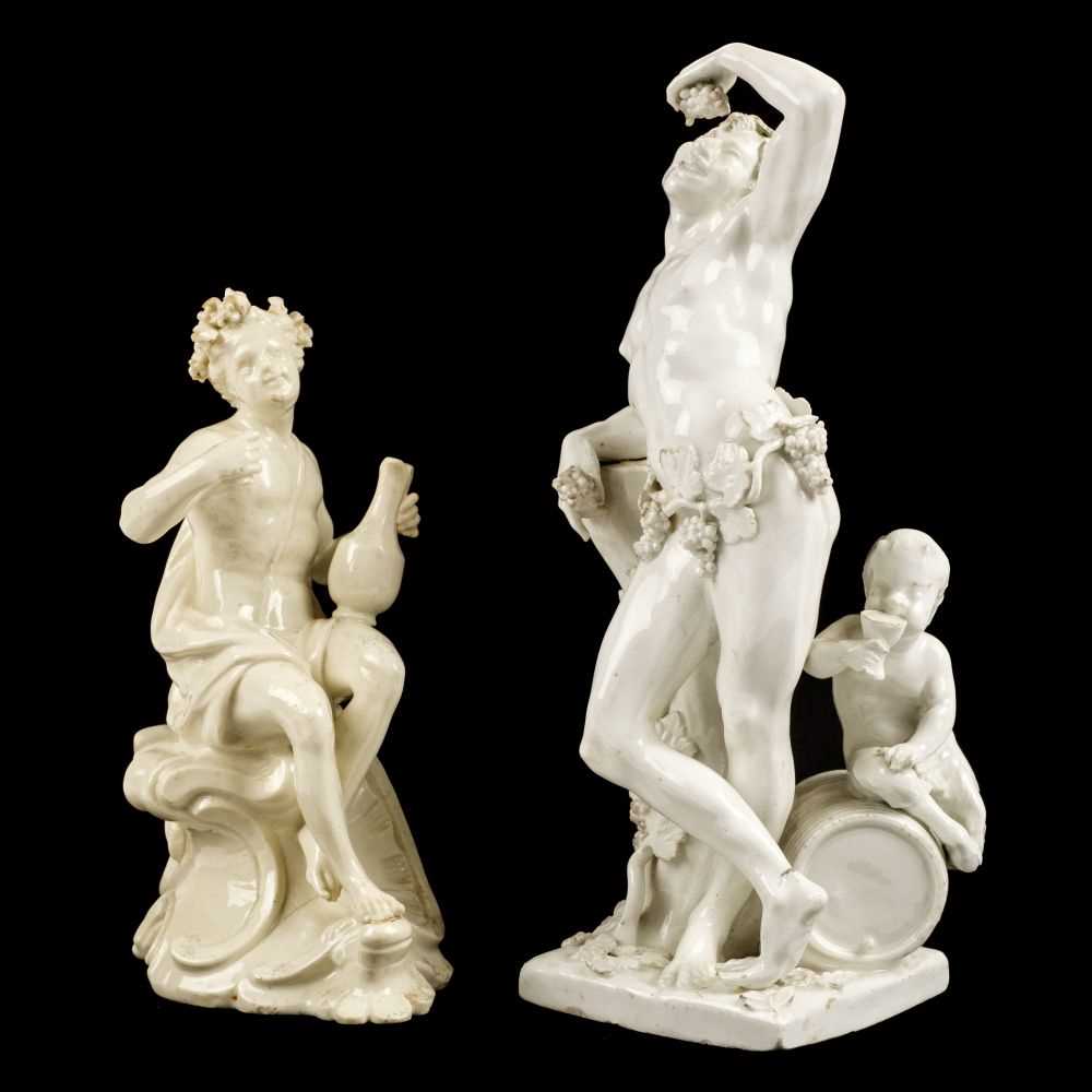 Lot 296 - Blanc de Chine. A pair of Bacchus figures, 19th century