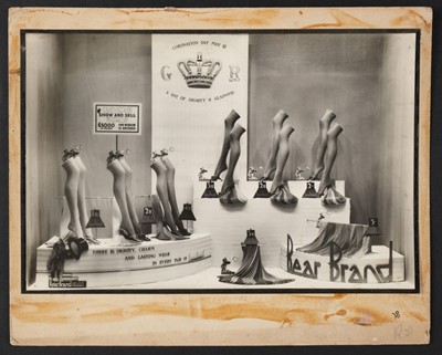 Lot 85 - Shop fronts. An assorted group of 10 shop front display photographs, c. 1950s