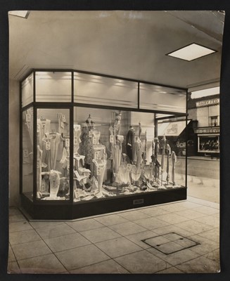 Lot 85 - Shop fronts. An assorted group of 10 shop front display photographs, c. 1950s