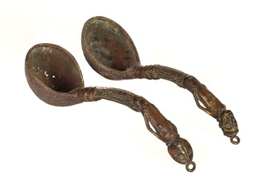 Lot 251 - West Africa. A pair of brass ceremonial ladles
