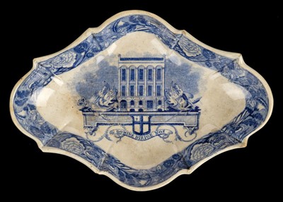 Lot 330 - The City of London Tavern. A blue and white pottery dish c.1830