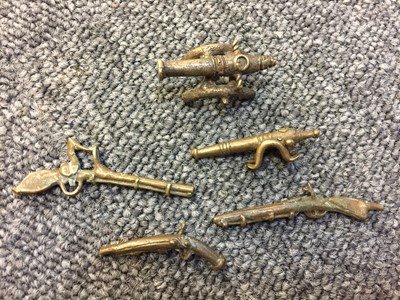 Lot 242 - Ashanti. A collection of gold weights and related items