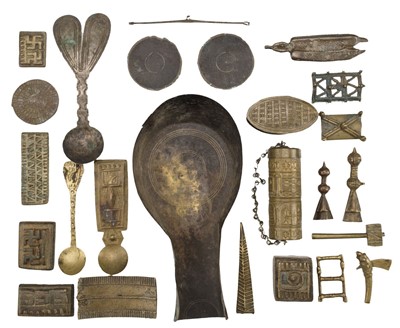 Lot 244 - Ashanti. A collection of gold weights and related items