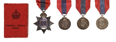 Lot 59 - Imperial Service Medals. A collection of Imperial Service Medals