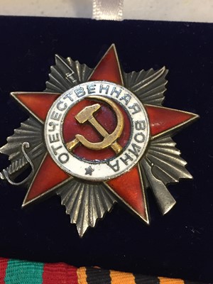 Lot 53 - Soviet Union. A WWII Order of the Patriotic War group to female