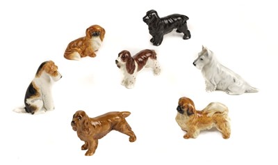 Lot 317 - Royal Worcester. A collection of dogs