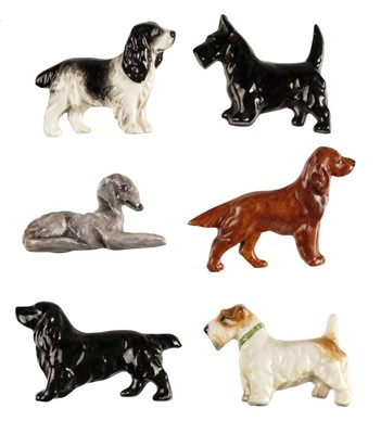 Lot 316 - Royal Worcester. A collection of dog brooches