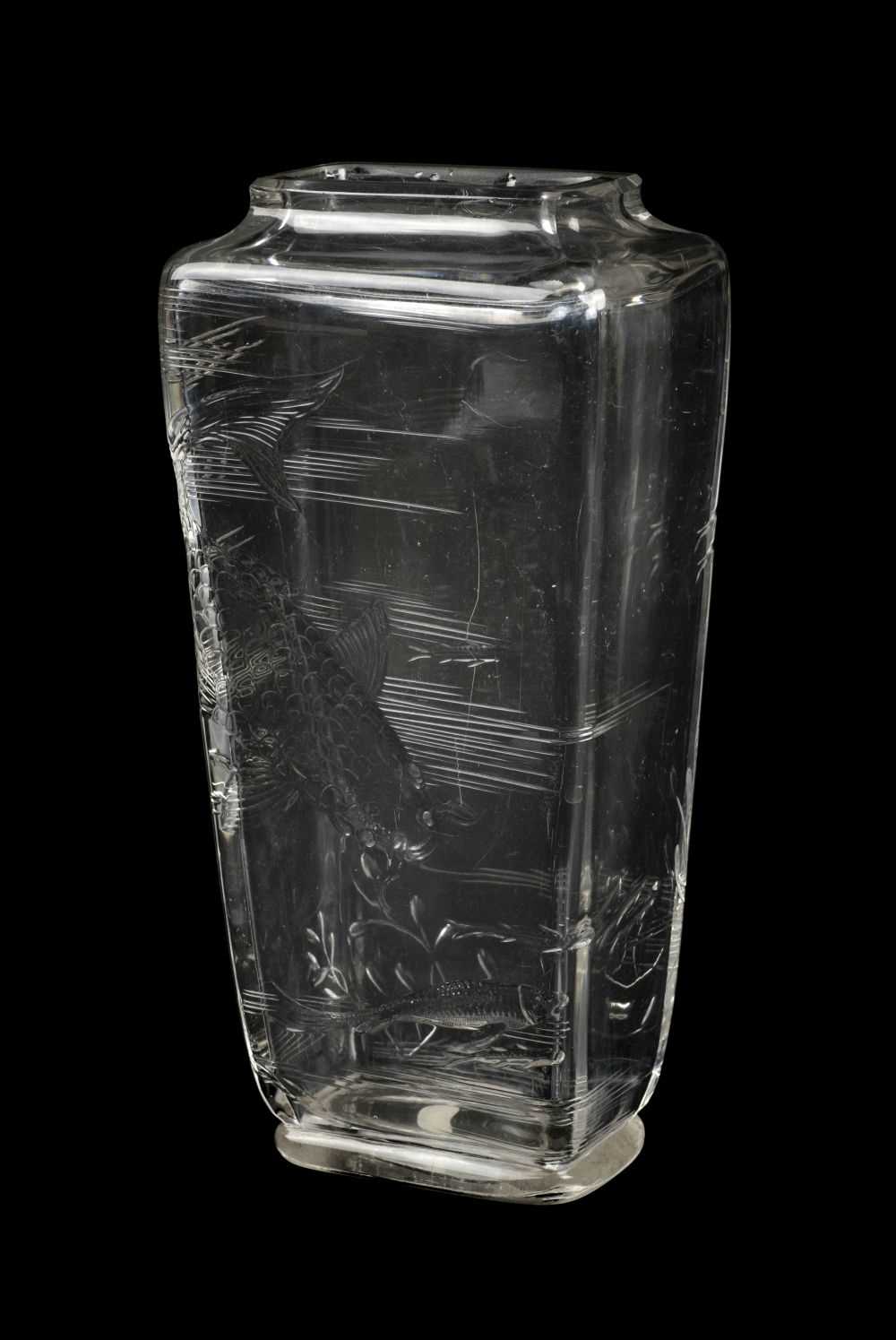 Lot 149 - Baccarat. A glass vase with koi carp moulded decoration