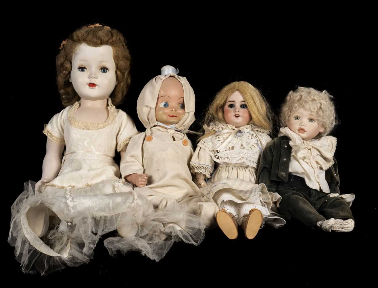 Lot 483 - Dolls. A bisque head doll, French, early 20th century, & 3 others