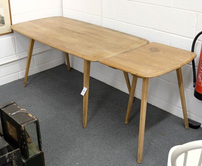 Lot 253 - Ercol. A light Ercol table and 8 chairs