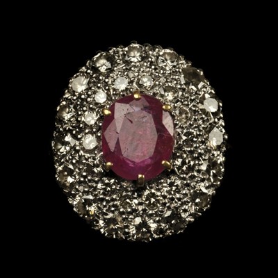 Lot 141 - Ring. An 18ct gold & platinum diamond and ruby ring