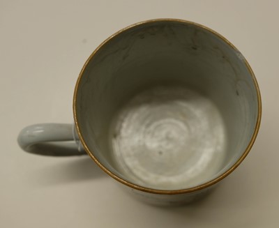 Lot 60 - Mug. An 18th century Chinese porcelain mug and dish